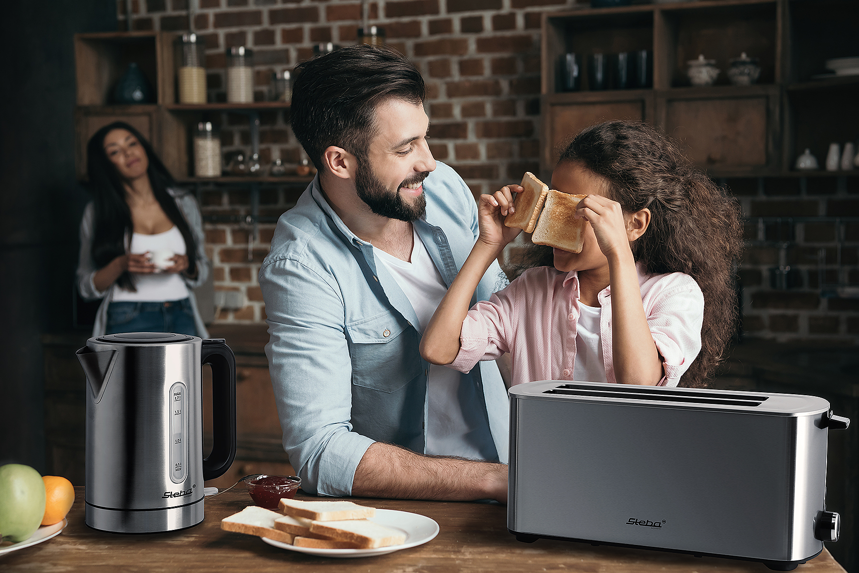 bearded man looking at cute little girl holding toasts in kitchen